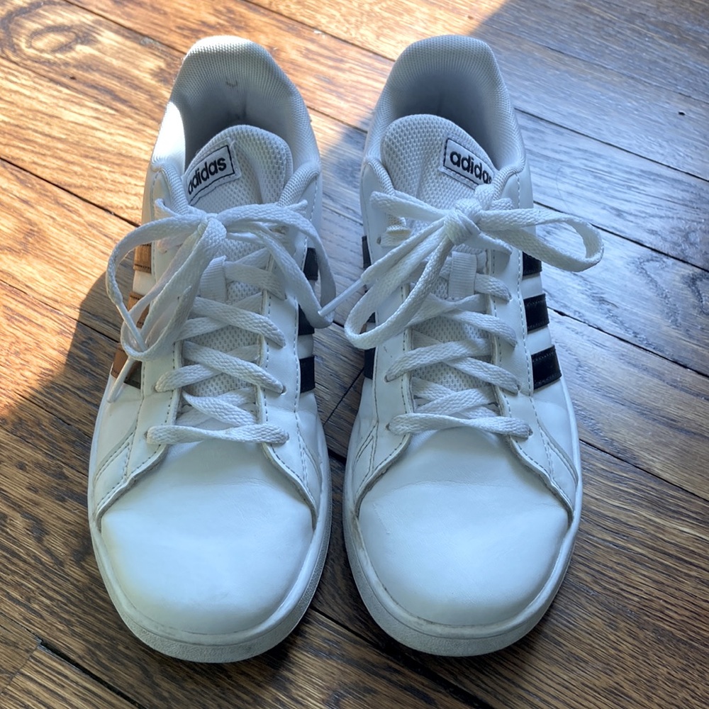 White with black stripe adidas shoes